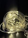 Светеща завеса 100 топло бели LED лампички